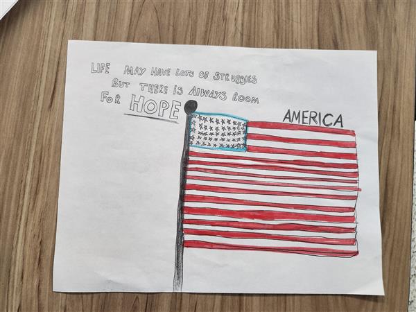 Card with U.S. flag reads Life May have lots of struggles but there is always room for hope, America