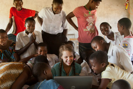 Chocolate University student with Tanzanian children 