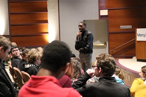 Keynote speaker engages with student question 