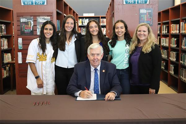  Governor Mike Parson ceremoniously signs bill at Kickapoo High School