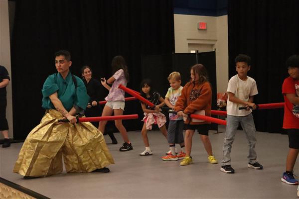Samurai Sword Soul performs at Holland Elementary ahead of the 24th Annual Japanese Fall Festival.