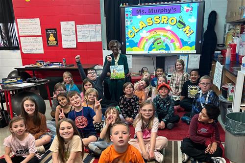  Dr. Grenita Lathan surprises students as a mystery reader at McBride Elementary